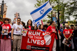 Run for Their Lives hosts a march to raise awareness of the hostages held in Gaza on Sunday in Boulder, Colorado. 